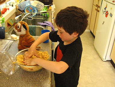 helping make cornbread dressing